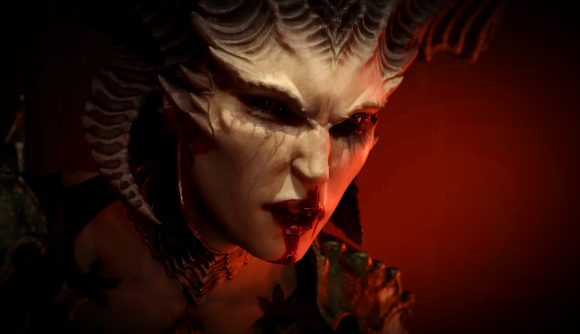 Diablo 4 handheld suppot: Lilith, a demonic woman with dark horns coming from her skull, glares downward with her mouth curved up into a snarl
